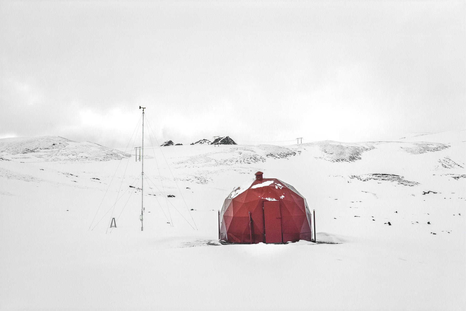 Krafla power station, Iceland @ Alison De Mars snow landscape red igloo mountains fine art photography